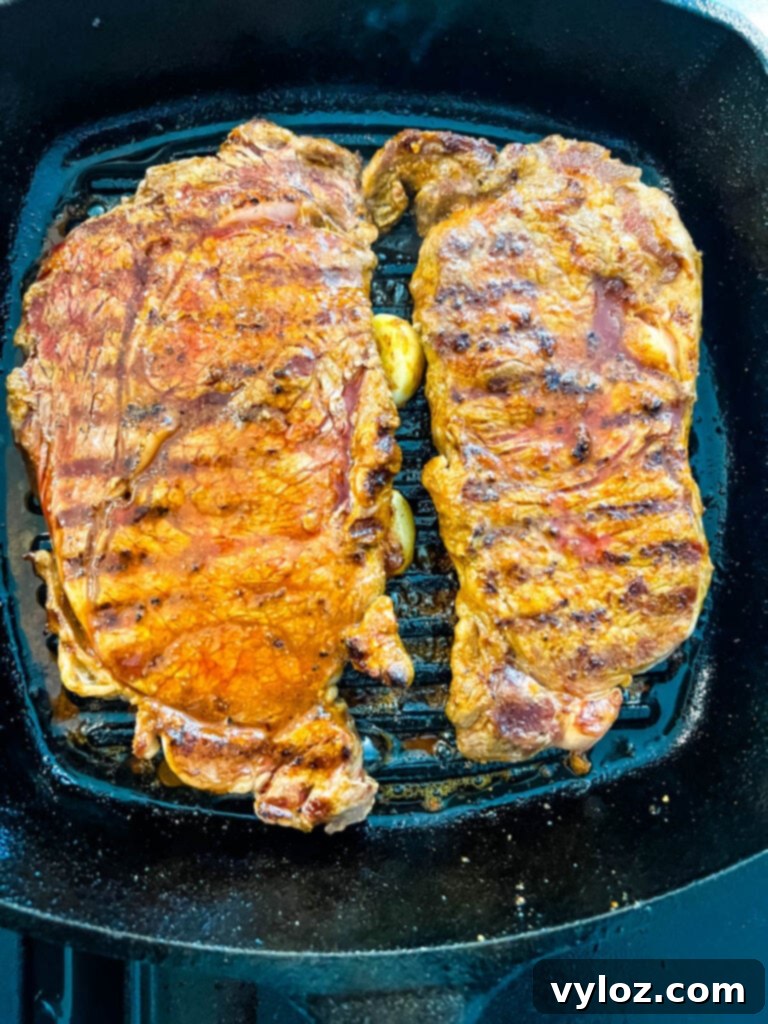Zesty Lemon Pepper Steak 9 lemon pepper steak in a cast iron skillet