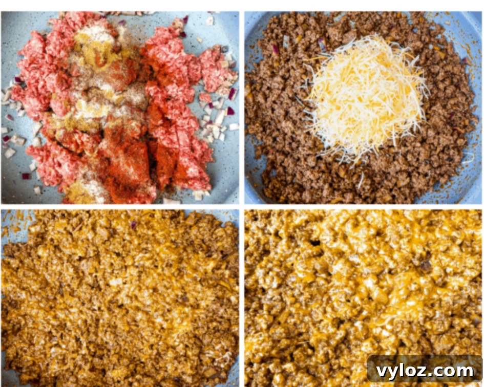 Close-up of a tray of uncooked beef and cheese empanadas, perfectly crimped and ready for the oven or air fryer.