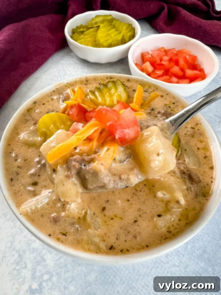 Hearty Slow Cooker Cheeseburger & Potato Soup 11 a spoonful of cheeseburger soup