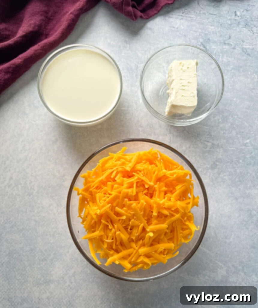 Hearty Slow Cooker Cheeseburger & Potato Soup 5 half and half, cream cheese, and shredded cheddar in glass bowls