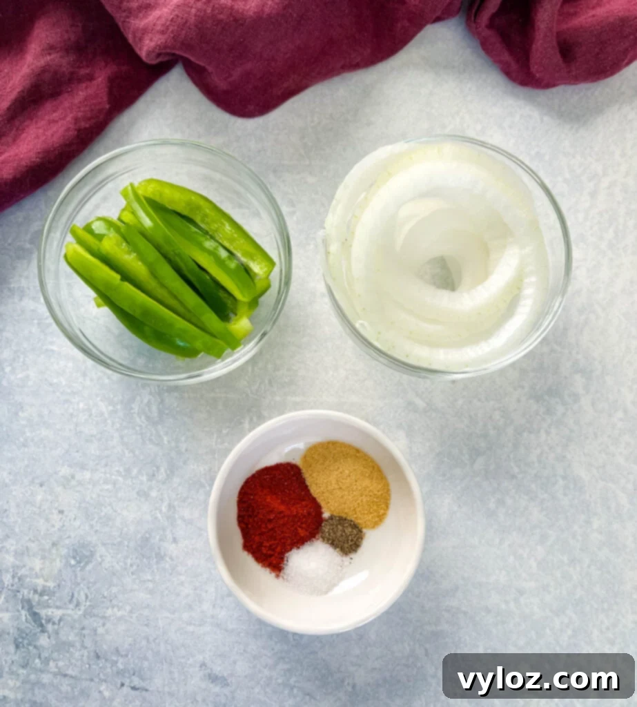 green peppers, onions, and spices in white bowls