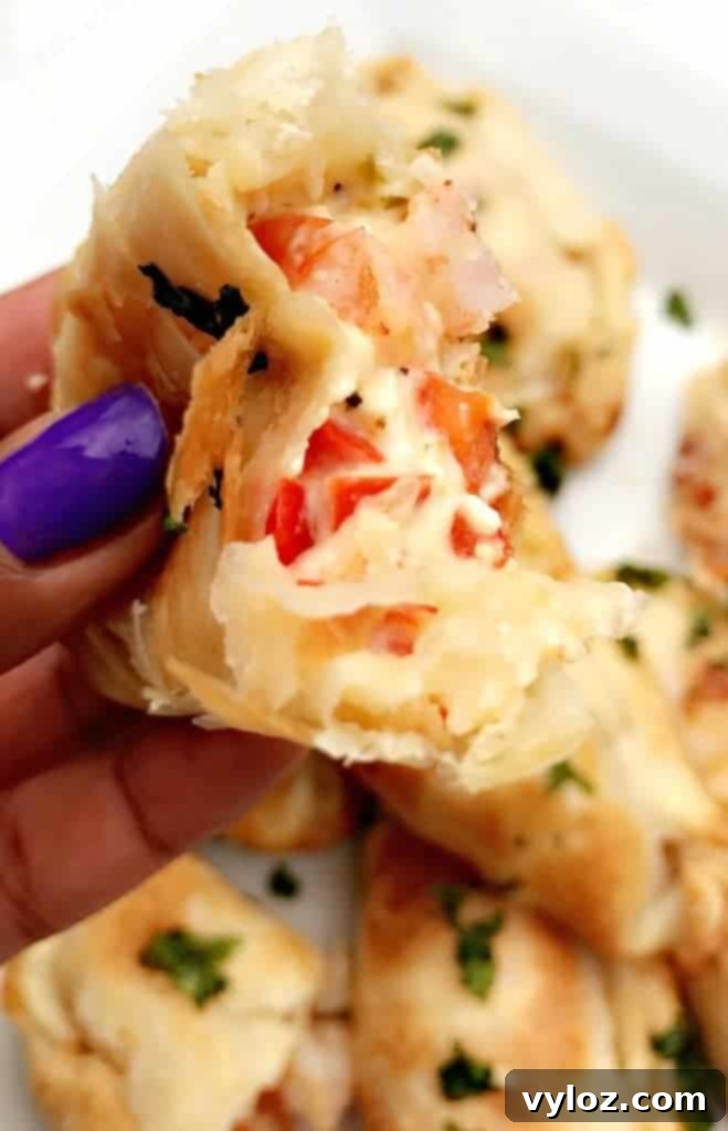 Savory Shrimp Red Pepper Cream Cheese Empanadas 7 Demonstration of sealing the edges of Shrimp Red Pepper Cream Cheese Empanadas