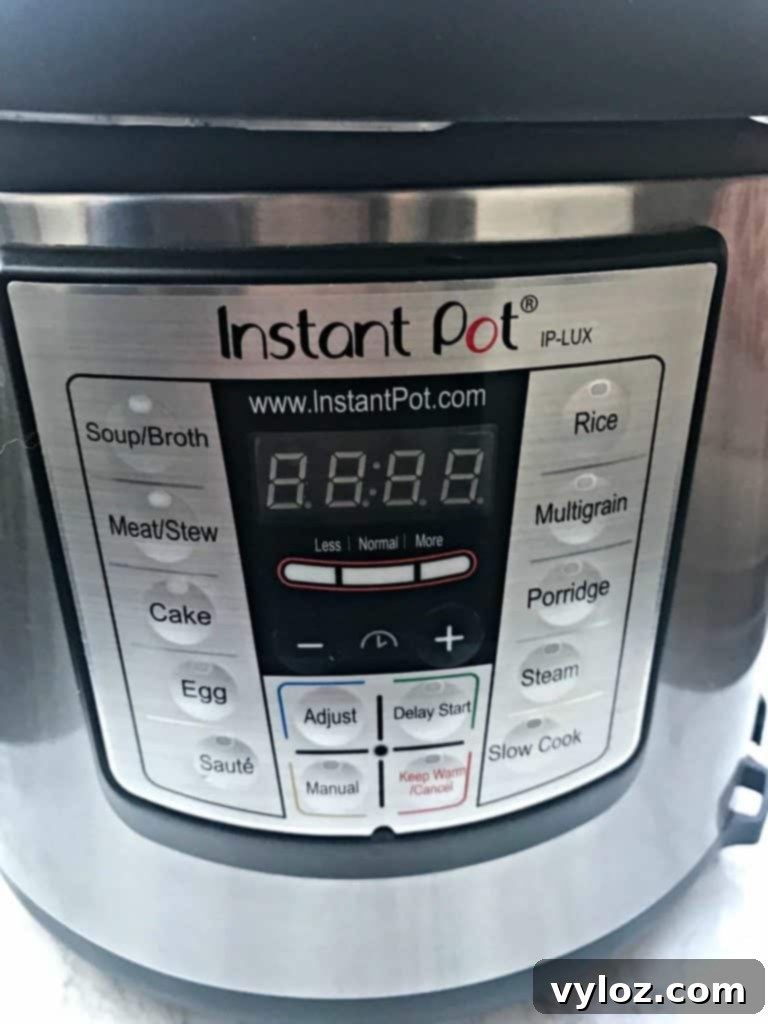 Spaghetti squash halves sit inside an Instant Pot, demonstrating the ease of pressure cooking this healthy vegetable.