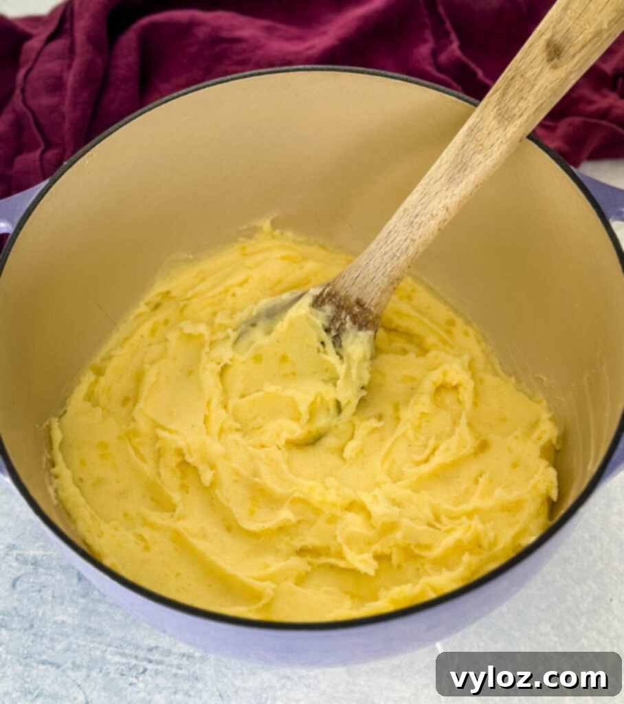 Velvety Buttermilk Mash 8 Southern buttermilk mashed potatoes in a Dutch oven