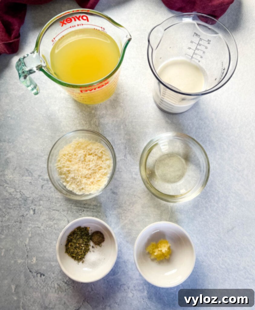 Individual bowls containing chicken broth, white wine, Parmesan cheese, heavy cream, Italian seasoning, and garlic.