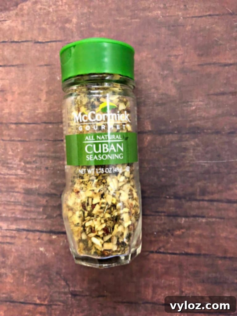 Instant Pot Arroz con Pollo Drumsticks 6 A jar of McCormick's Cuban seasoning blend, an easy-to-find option for authentic Arroz con Pollo flavor.