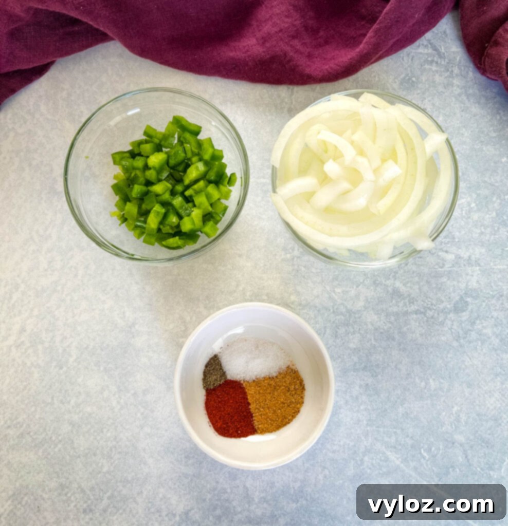 green peppers, onions, and spices in separate bowls