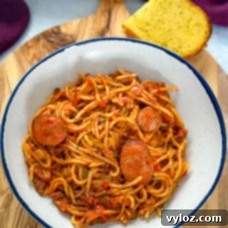 Ultimate Italian Sausage Spaghetti 9 beef and sausage spaghetti in a white bowl