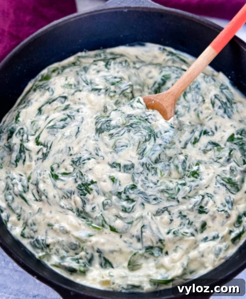 Classic Southern Creamed Spinach, Fresh or Frozen 2 steakhouse creamed spinach in a cast iron skillet