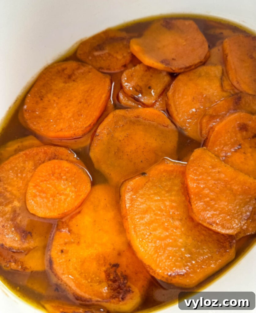 Sticky Sweet Slow Cooker Sweet Potatoes 10 candied sweet potatoes yams in a Crockpot slow cooker