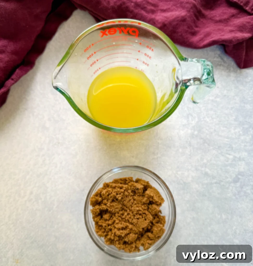 Fresh pineapple juice and golden brown sugar in separate glass bowls