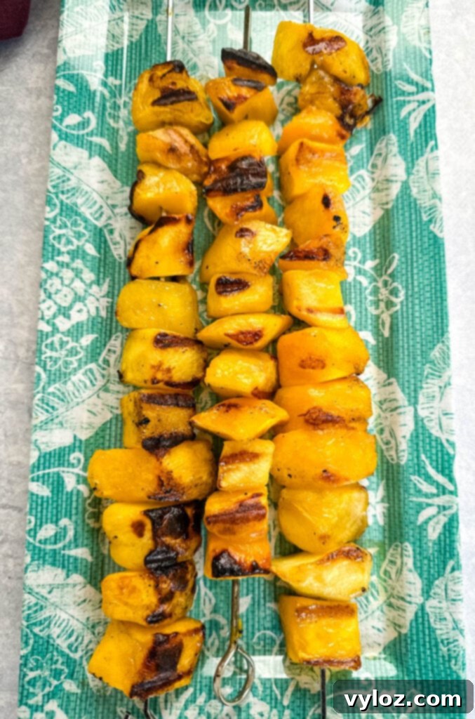 grilled mango on a blue plate