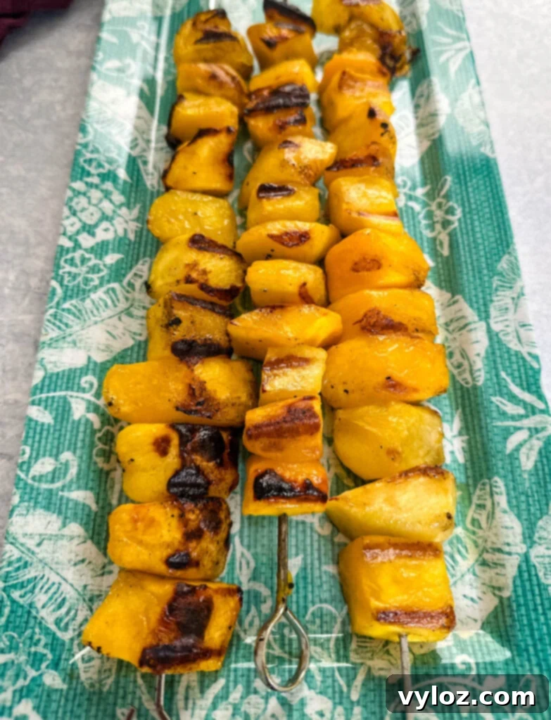 grilled mango on a blue plate
