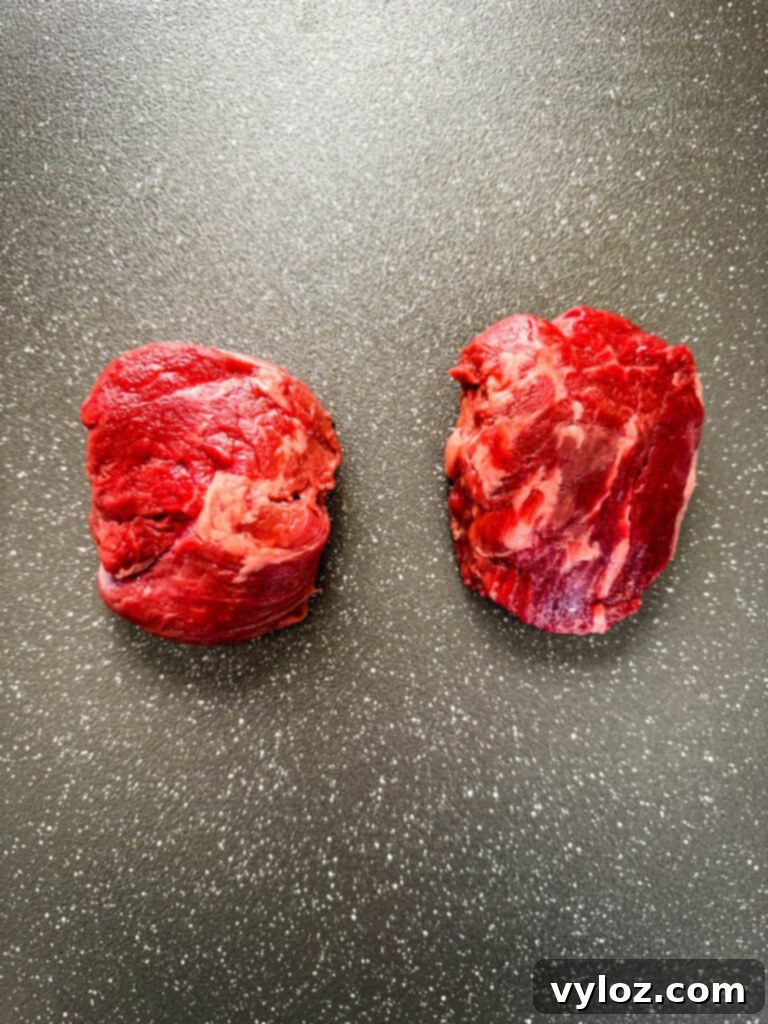 raw filet mignon on a plate