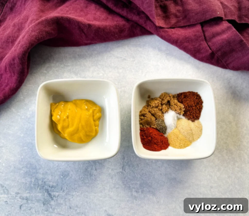 yellow mustard and spices in separate white bowls