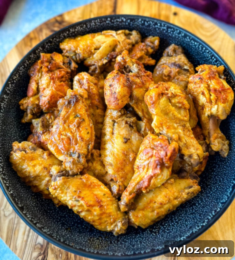 Crockpot chicken wings in a black bowl