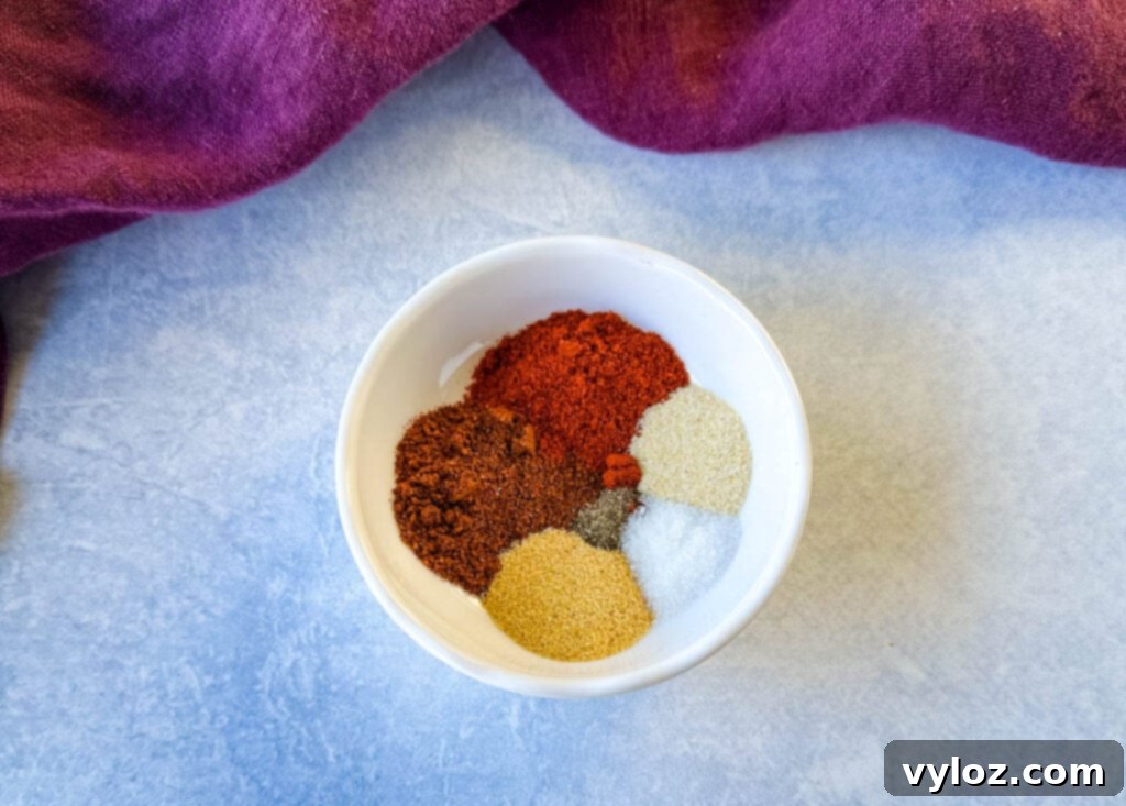 chicken dry rub spices in a white bowl