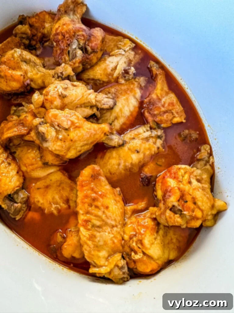 cooked chicken wings in a slow cooker Crockpot