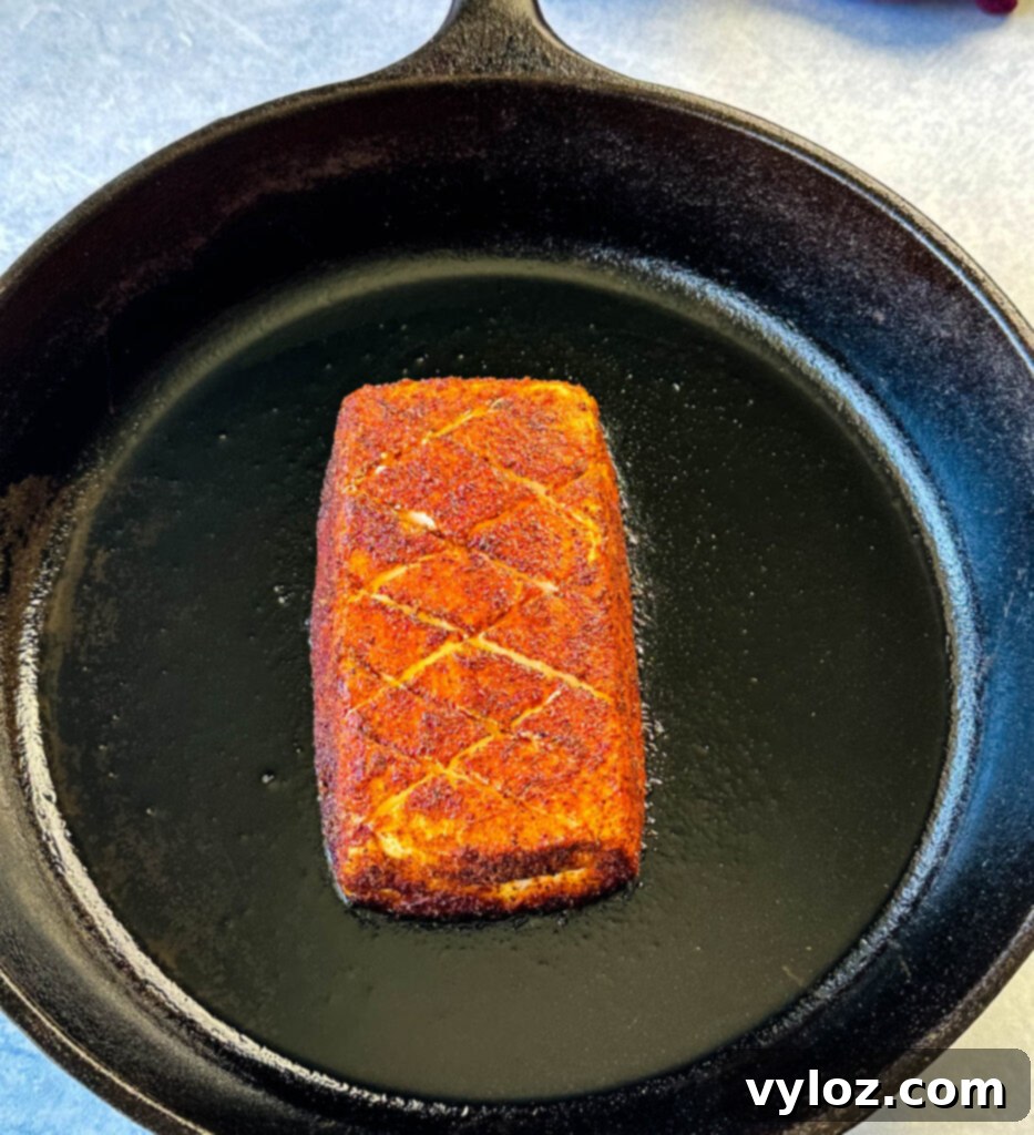 smoked cream cheese in a cast iron skillet
