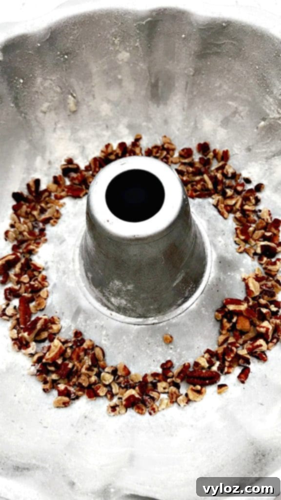 Beautifully glazed skinny lightened-up Puerto Rican rum cake in a bundt pan