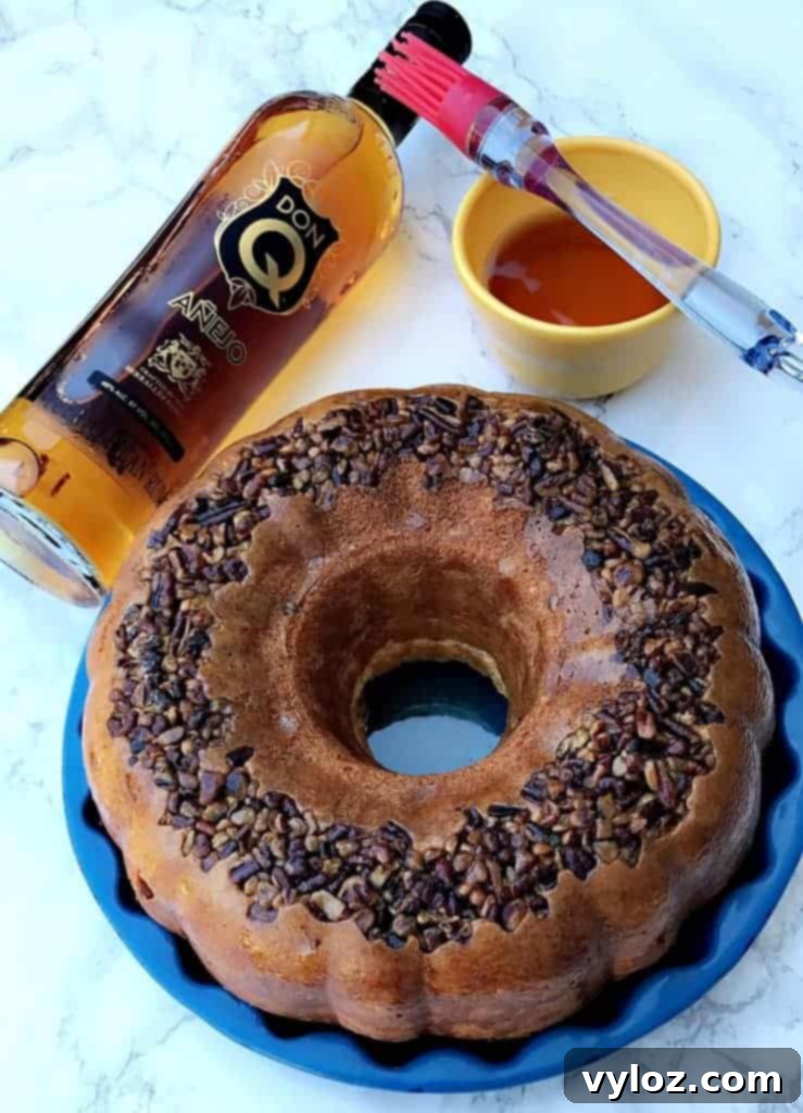 Freshly baked skinny lightened-up Puerto Rican rum cake cooling in a bundt pan