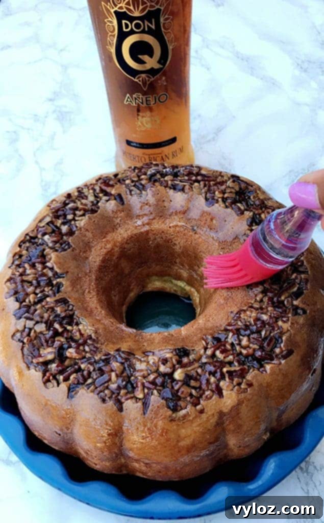 A slice of skinny lightened-up Puerto Rican rum cake ready to be served