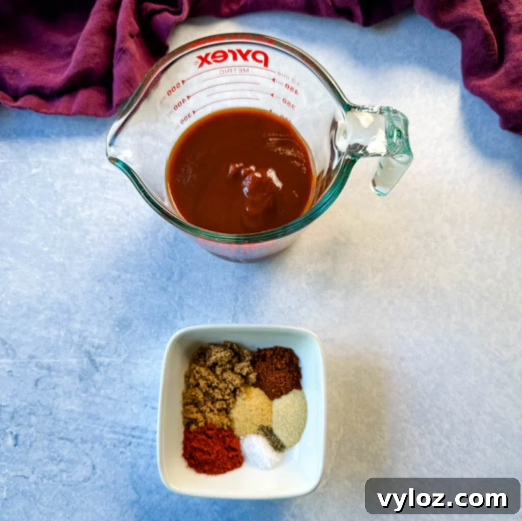 BBQ sauce and BBQ rub spices in a white bowl