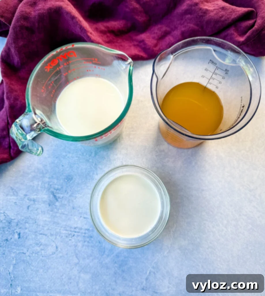 milk, heavy cream, and broth in separate bowls