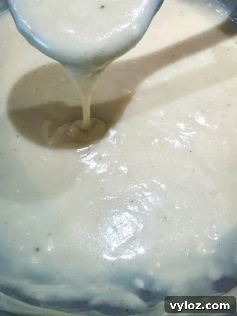 A spoonful of creamy homemade cream of chicken soup