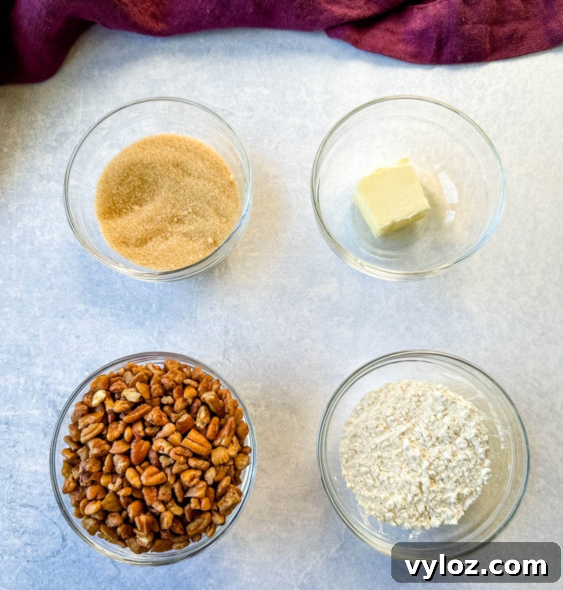 Golden Sweet Potato Pecan Delight 5 Separate bowls of brown sugar, chopped pecans, melted butter, and flour, ingredients for pecan streusel topping.