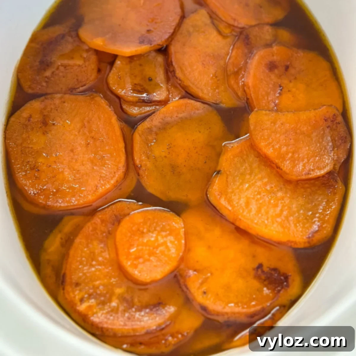 16 Essential Slow Cooker Thanksgiving Recipes 14 Slow Cooker Crockpot Candied Sweet Potatoes (Soul Food Yams)