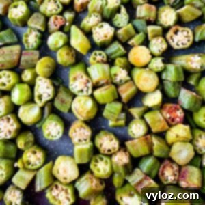 Close-up of golden-brown roasted okra in a serving bowl