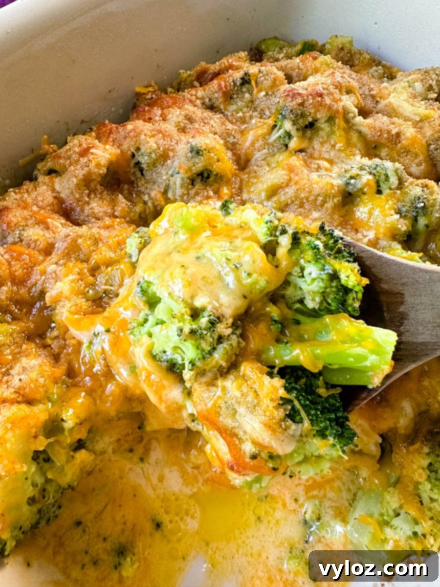 broccoli au gratin with cheese and breadcrumbs in a baking dish