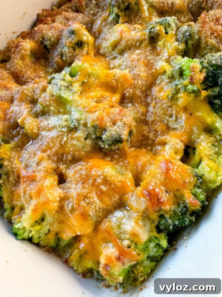 broccoli au gratin with cheese and breadcrumbs in a baking dish