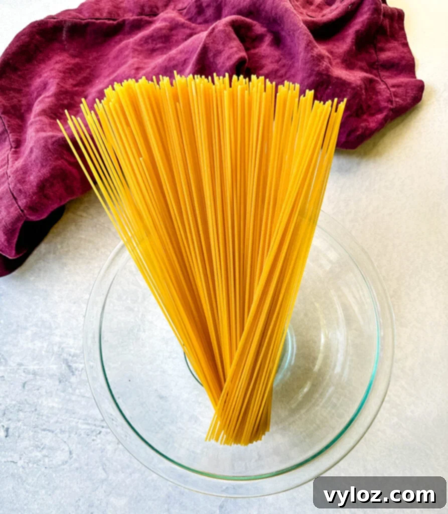 spaghetti pasta noodles in a glass bowl
