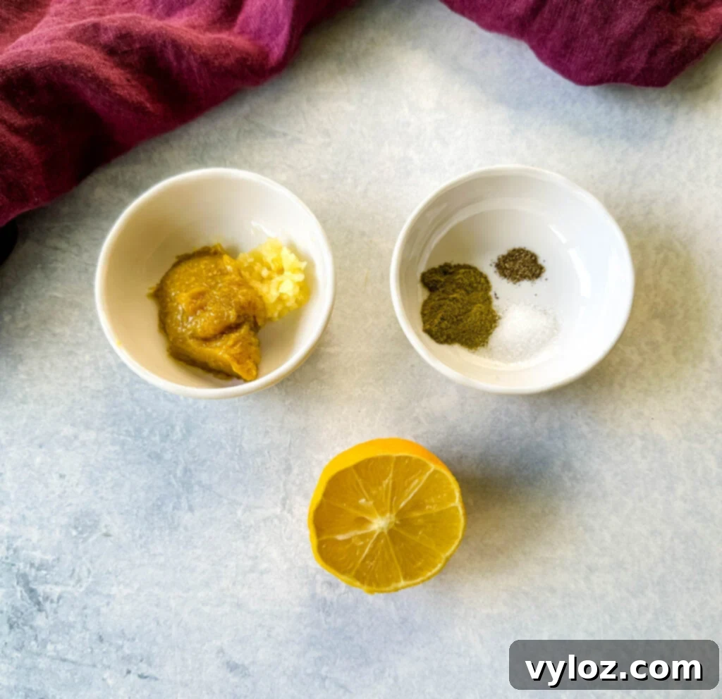 fresh lemon, bouillon, and spices in separate white bowls