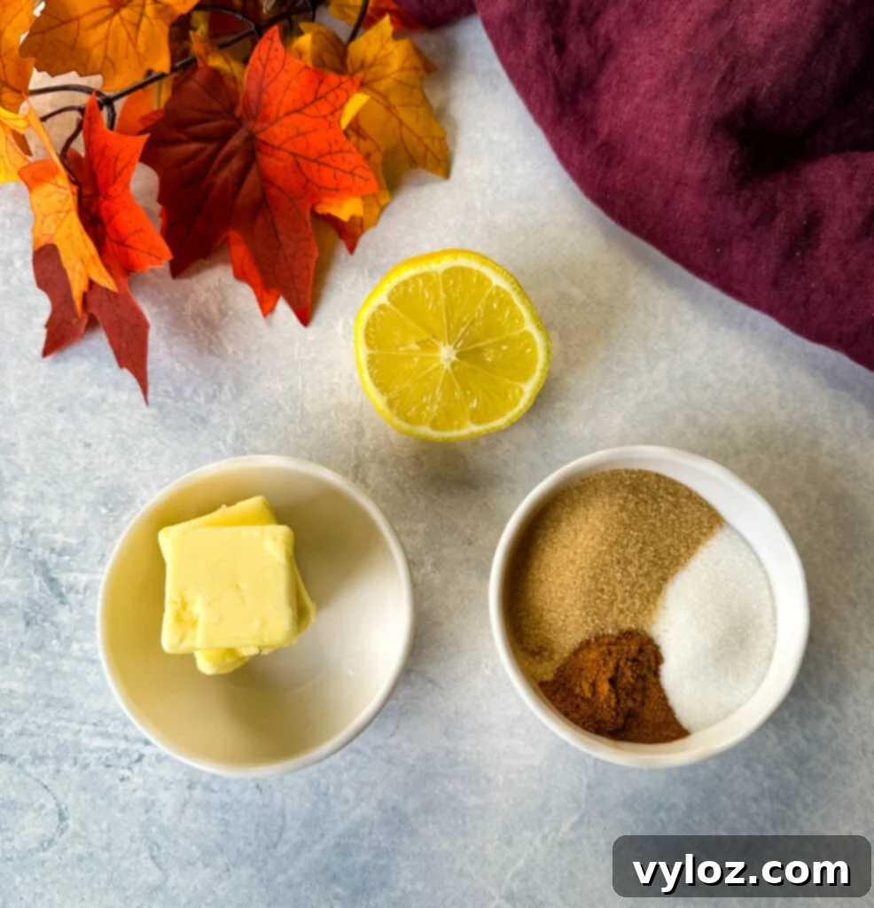 Down-Home Fried Apples 4 Butter, lemon, cinnamon, brown sugar, and salt presented in separate white bowls, ready for cooking.