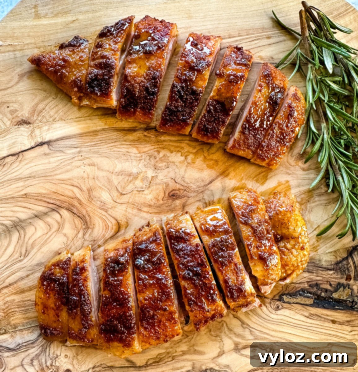Mastering Smoked Duck 9 smoked duck breast sliced on a wooden cutting board