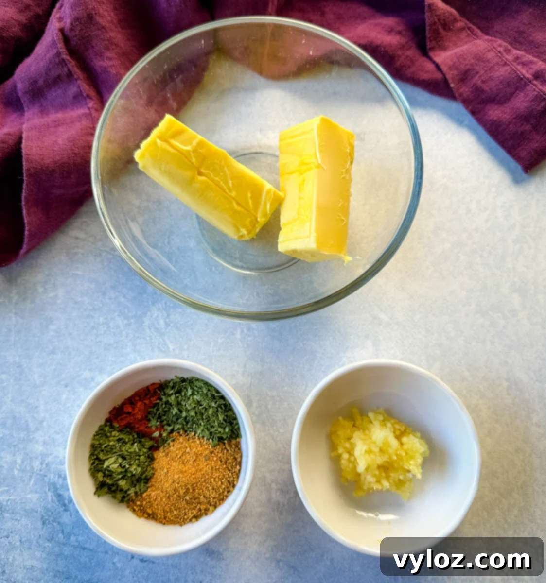 Bone-in or Boneless Garlic Butter Prime Rib 6 room temperature butter, spices, and minced garlic in separate white bowls
