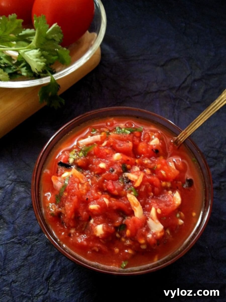 Fire roasted tomato onion garlic chutney in a bowl