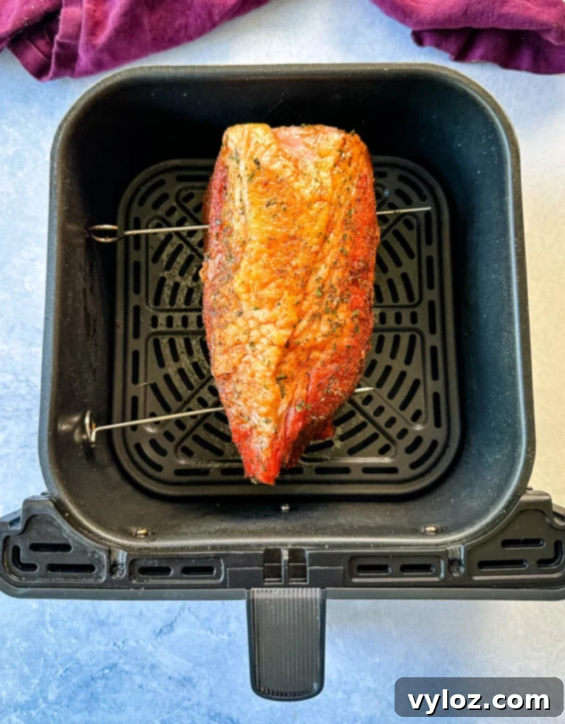 raw seasoned roast beef in an air fryer