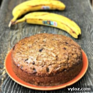 instant pot low carb banana nut bread on an orange plate next to bananas