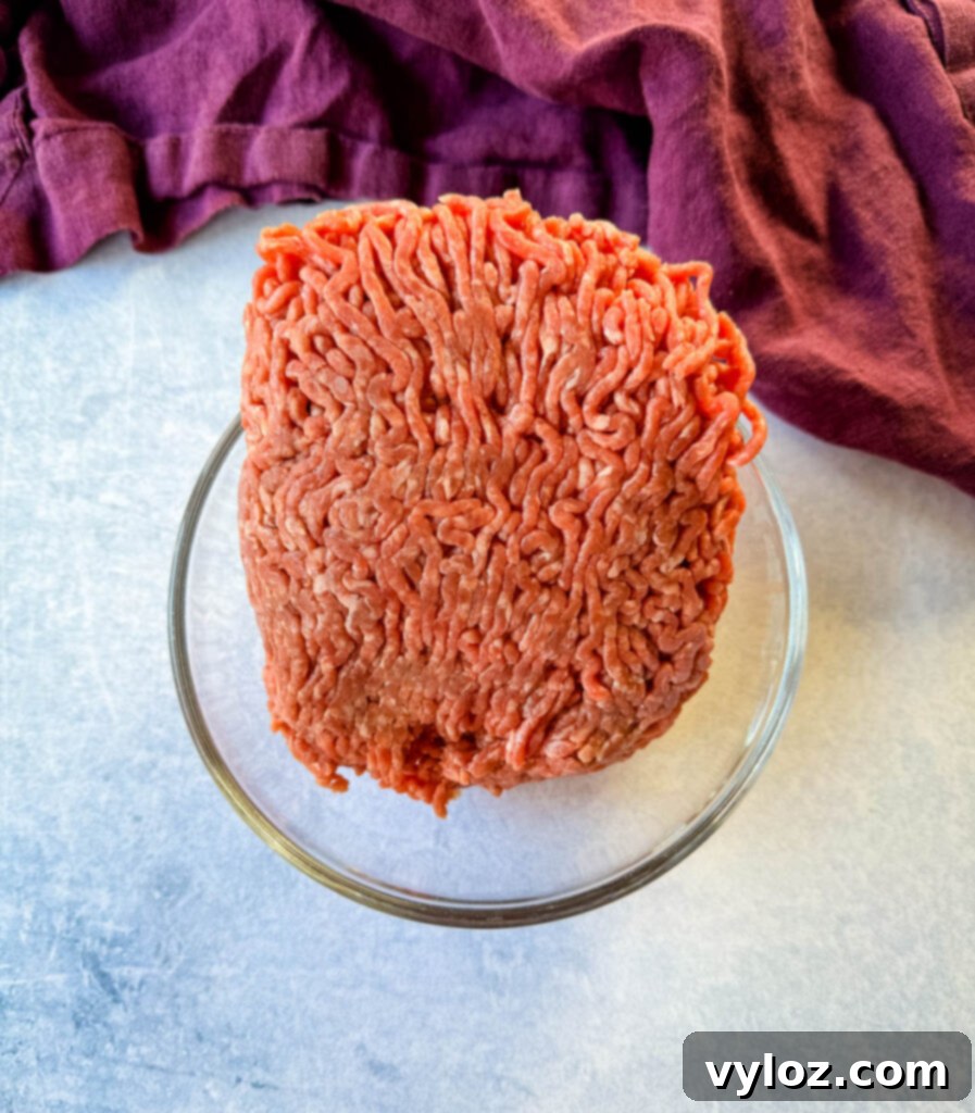 raw ground beef in a glass bowl