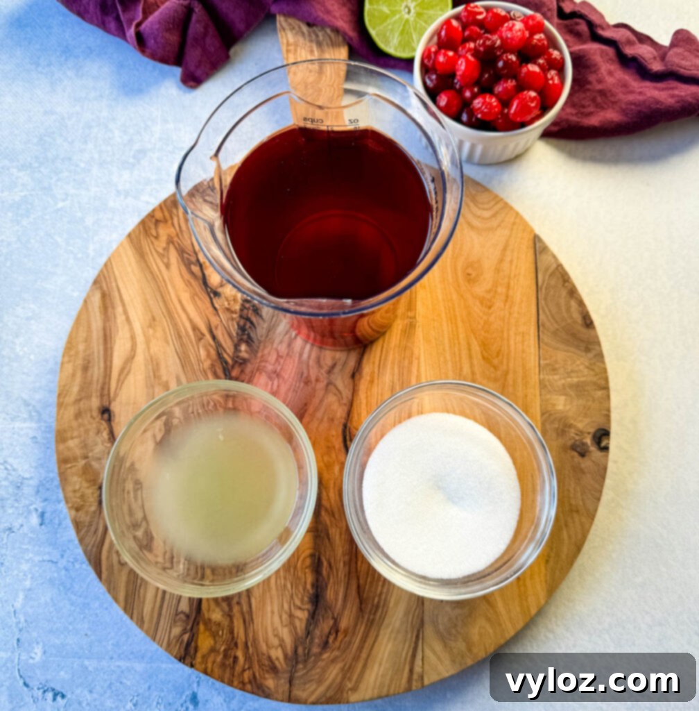 cranberry juice, lime juice, and sweetener in separate glass bowls