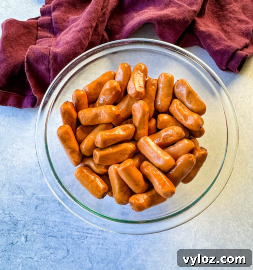 Sweet and Sticky BBQ Little Smokies 3 little smokies in a glass bowl
