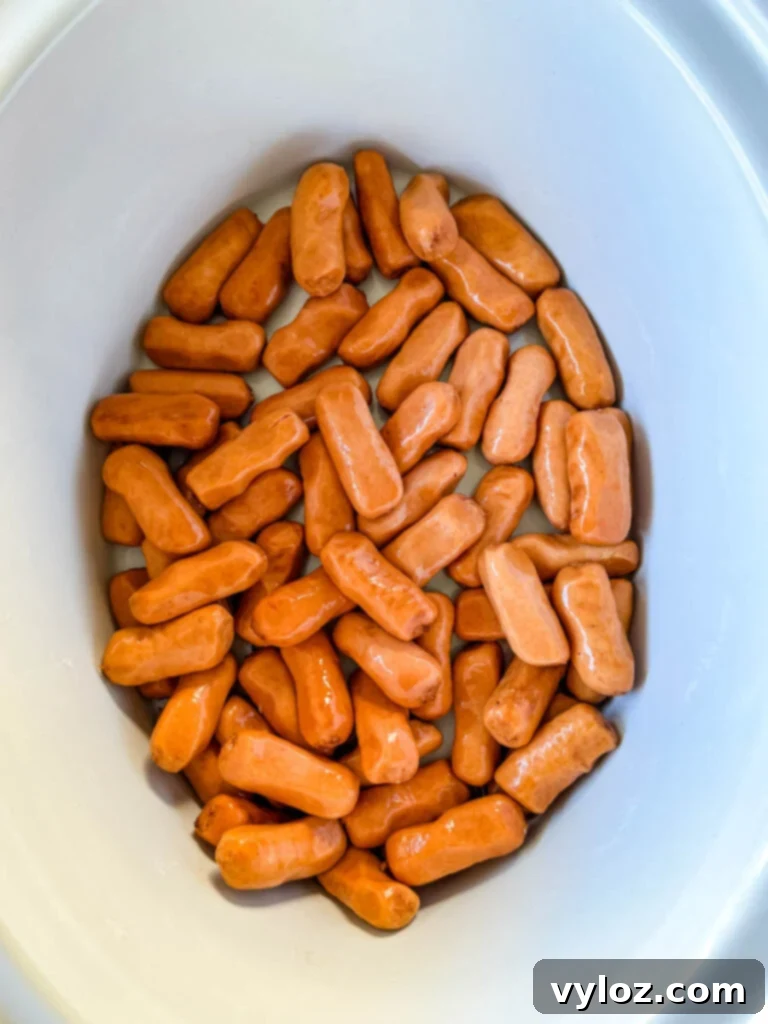 Sweet and Sticky BBQ Little Smokies 6 little smokies in a slow cooker Crockpot