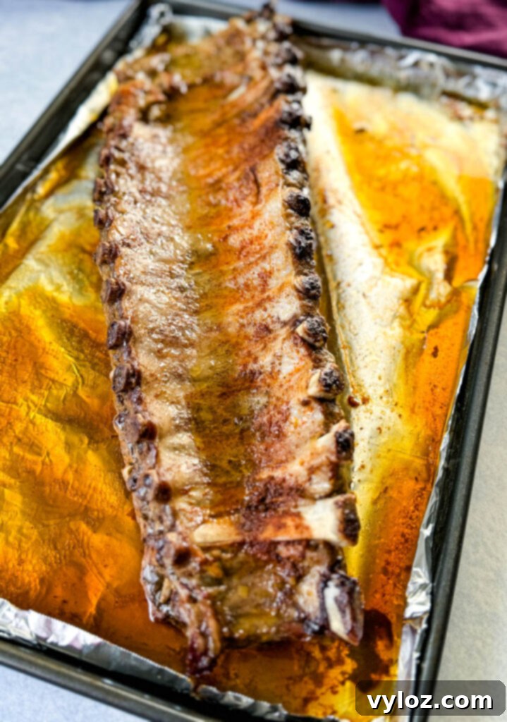 Fall-Off-The-Bone Oven Baby Back Ribs 7 baked ribs on foil
