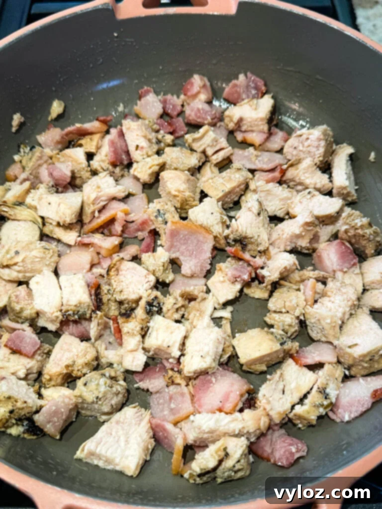 cooked chicken and bacon in a skillet
