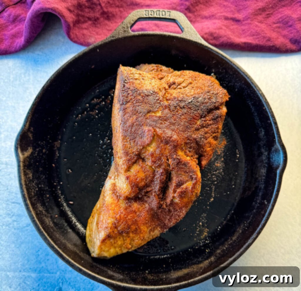 seared brisket in a cast iron skillet