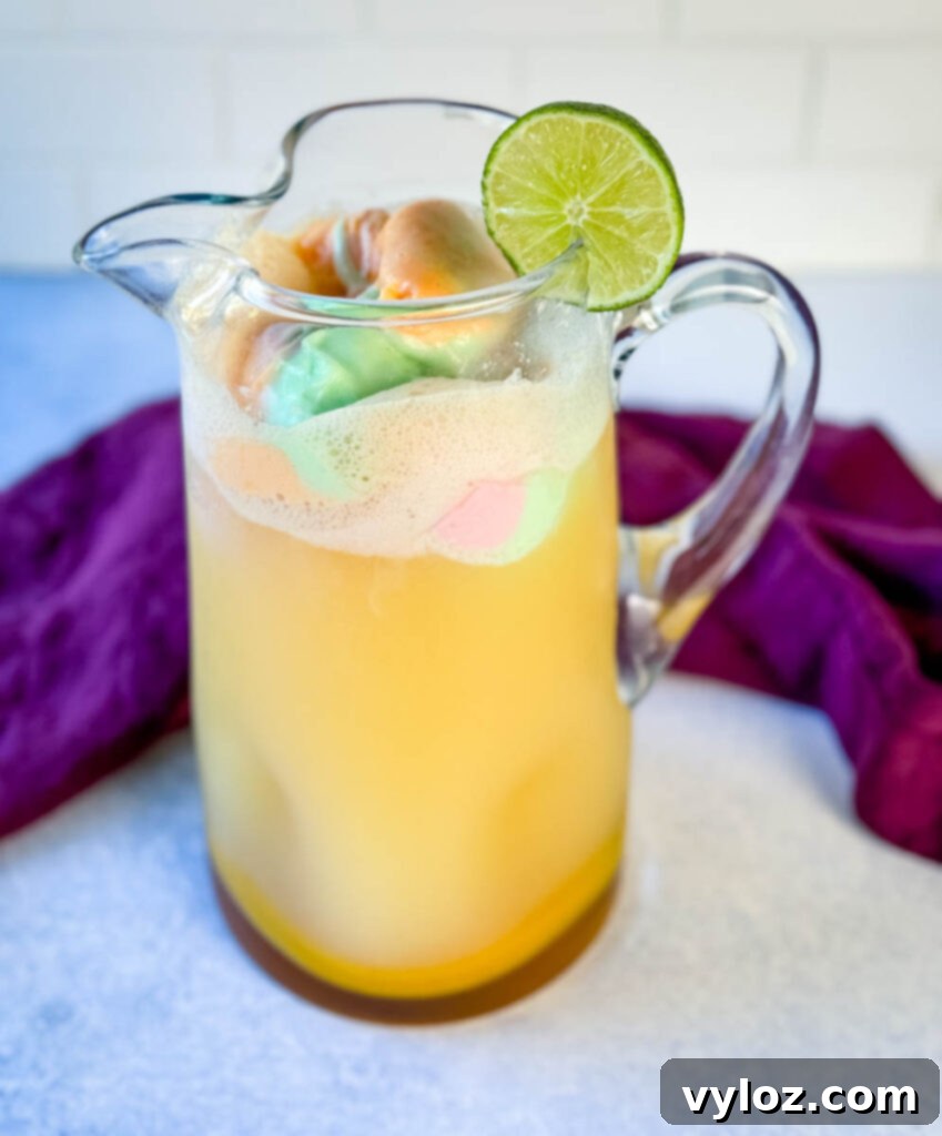 Kaleidoscope Sherbet Punch 5 rainbow sherbet punch in a glass pitcher